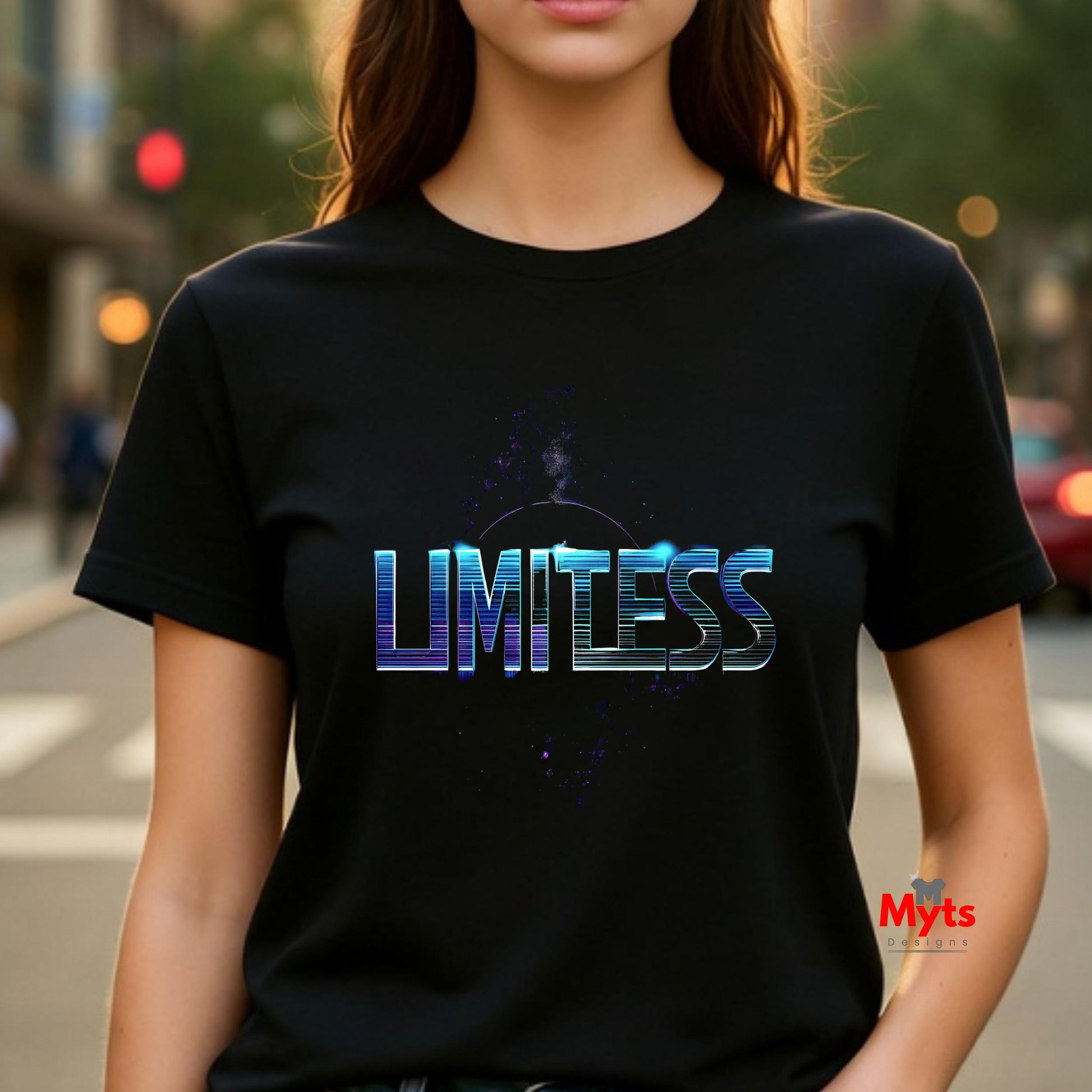 Person wearing a black t-shirt with 'LIMITLESS' printed on it, standing on a street.