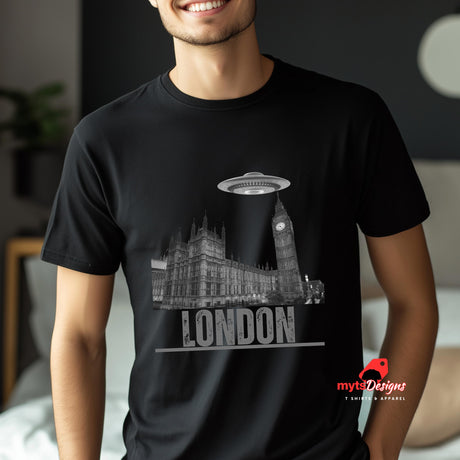 Front view of a young man wearing a black soft casual tee featuring London’s Big Ben and Parliament skyline with a stylized spaceship hovering above, printed on ultra-soft Gildan 64000 cotton.