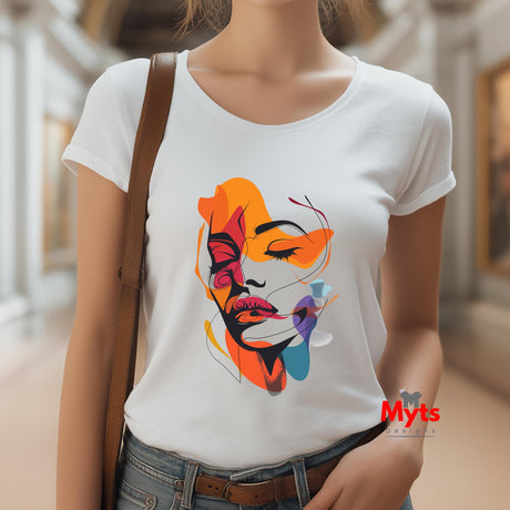 Person wearing a white t-shirt with a colorful abstract design, standing in an indoor setting.