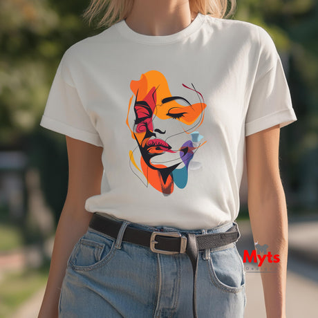 Person wearing a white t-shirt with a colorful abstract design outdoors