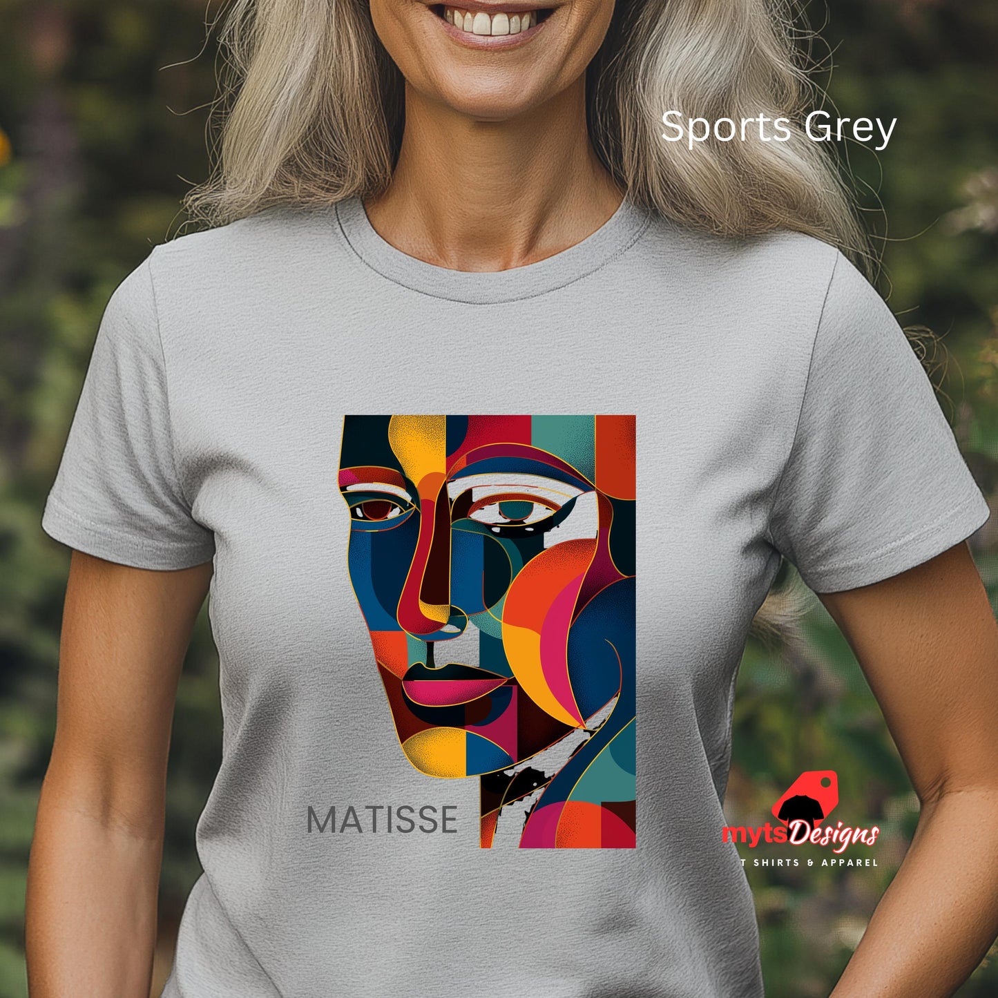 Person wearing a t-shirt with a colorful Matisse design and 'Sports Grey' text.