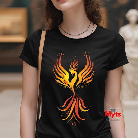 Person wearing a black t-shirt with a colorful phoenix design, standing indoors.