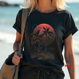 Person wearing a black t-shirt with a palm tree design by the beach