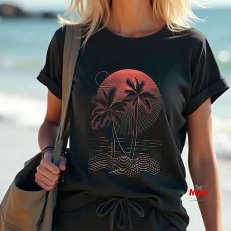 Person wearing a black t-shirt with a palm tree design by the beach