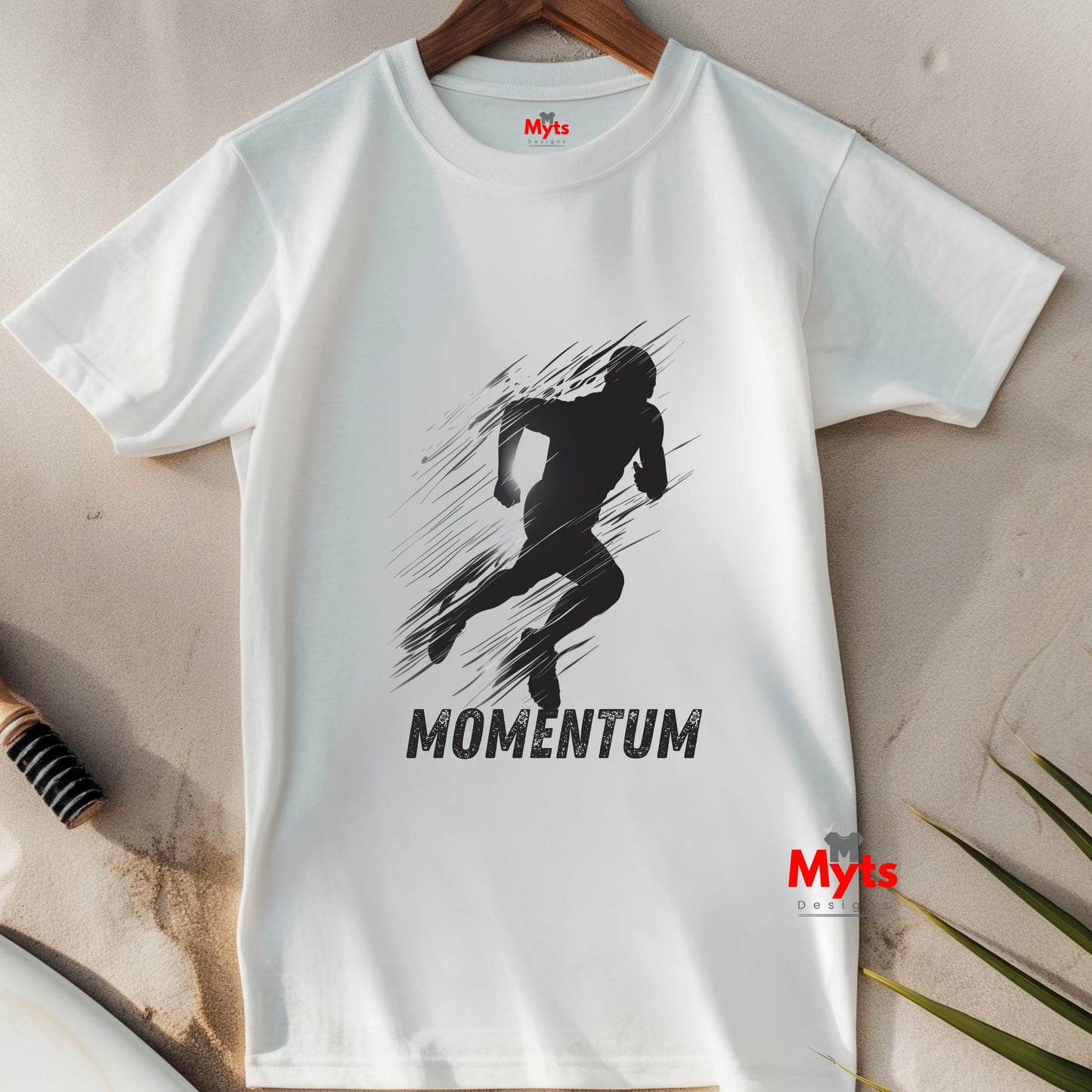 White t-shirt with black graphic and 'MOMENTUM' text on a neutral background