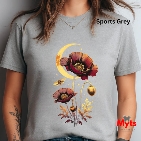 A woman wearing a light grey t-shirt with a graphic print of two burgundy poppy flowers, a yellow crescent moon, and gold acorns. The text 'Sports Grey' is visible on the upper right, and a 'Myts' brand logo is in the bottom right corner.