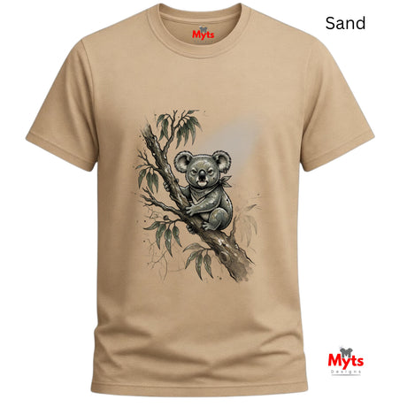 A sand-colored short-sleeve t-shirt with a graphic of a koala sitting on a tree branch. The word 'Sand' is written in the top right corner, and the 'Myts' brand logo is visible on the inner neck label and as a watermark in the bottom right corner.