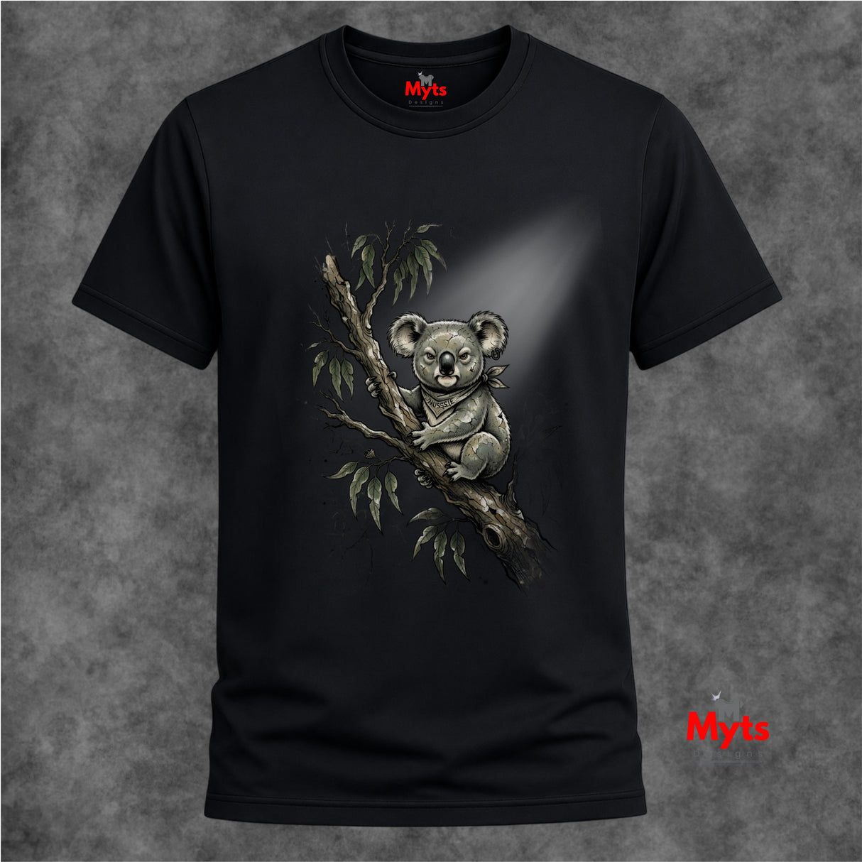 A black short-sleeve crewneck t-shirt featuring a detailed graphic of a koala sitting on a eucalyptus branch. The shirt is displayed against a textured gray background, with a red 'Myts' brand logo visible on the inner neck label and as a watermark in the bottom right corner.