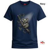 A navy blue short-sleeve t-shirt with a detailed graphic of a koala bear sitting on a tree branch with eucalyptus leaves. The word 'Navy' is printed in black text in the top right corner, and the 'Myts' brand logo is visible both inside the collar and as a watermark in the bottom right corner.