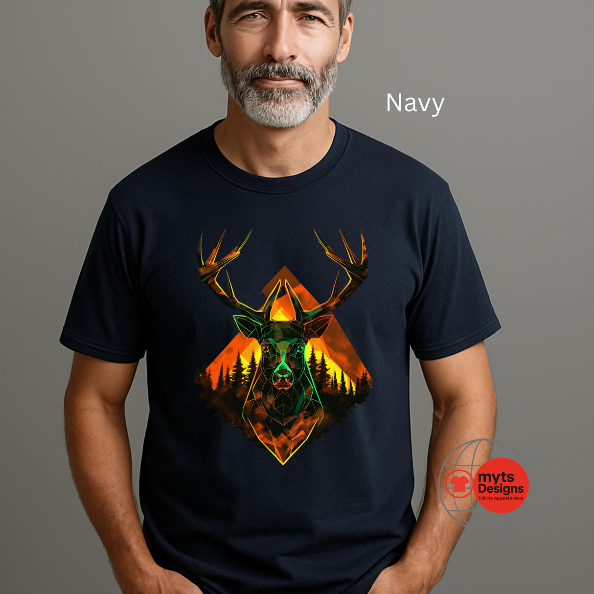 Man wearing a navy t-shirt with a deer and mountain design, branded 'myts Designs'.