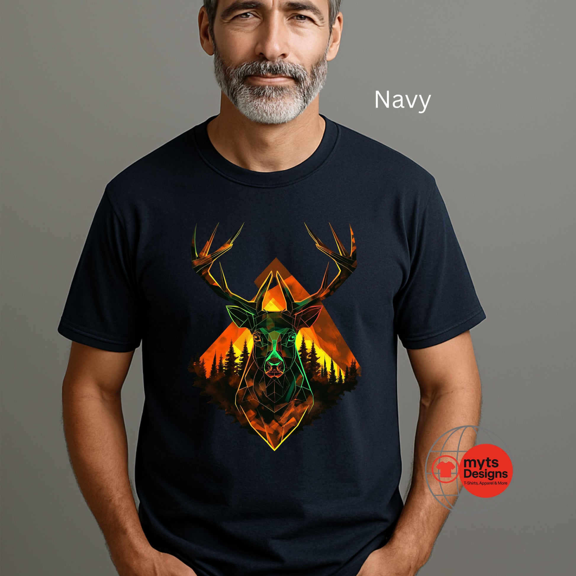 Man wearing a navy t-shirt with a deer and mountain design, branded 'myts Designs'.