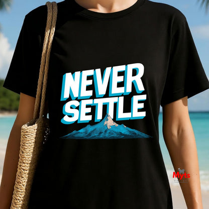 Person wearing a black t-shirt with 'NEVER SETTLE' text and mountain graphic on a beach.