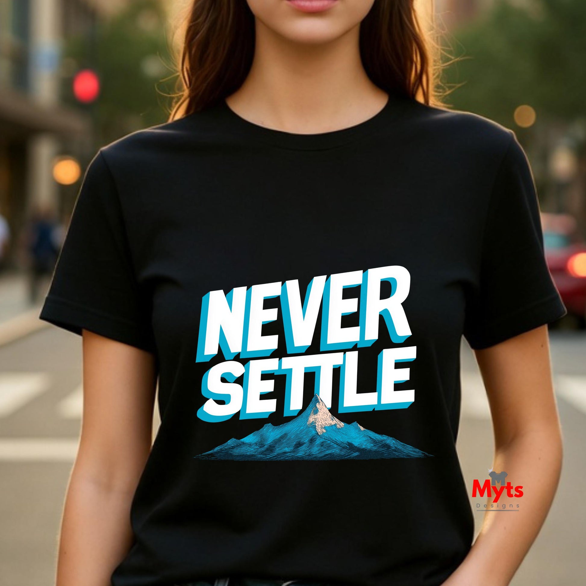 Person wearing a black t-shirt with 'Never Settle' graphic and mountain design, brand 'Myts' visible.