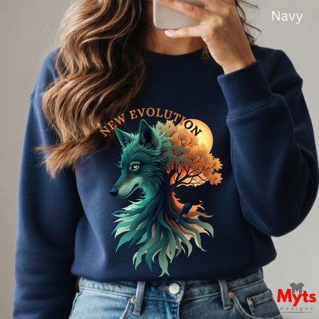 A person wearing a navy crewneck sweatshirt with a large graphic print of a wolf and tree, holding a phone to take a mirror selfie. The text 'Navy' is in the top right corner, and a 'Myts designs' logo is in the bottom right corner.