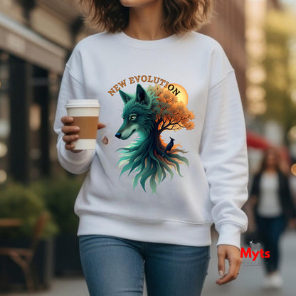 A woman wearing a white crewneck sweatshirt with a colorful graphic of a wolf and tree, holding a coffee cup in an outdoor urban setting.