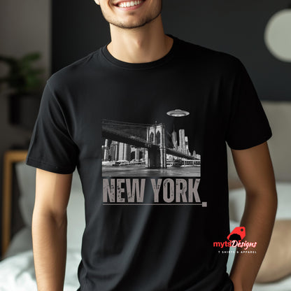 Black soft casual tee showing the New York City skyline with a stylized spaceship graphic soaring above, worn by a man.