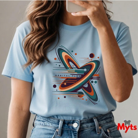 Person wearing a light blue t-shirt with a colorful graphic design, taking a selfie.