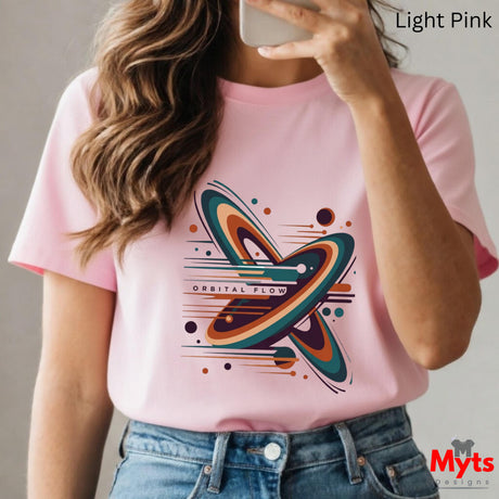 Person wearing a pink t-shirt with a colorful butterfly design, holding a phone.
