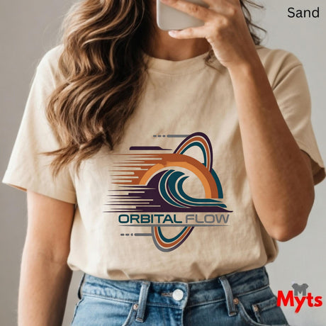 Person wearing a sand t-shirt with 'Orbital Flow' logo, holding a phone.