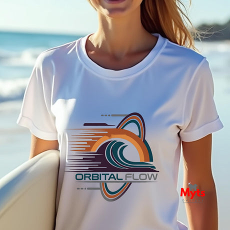 Person wearing a white t-shirt with 'Orbital Flow' design by the ocean