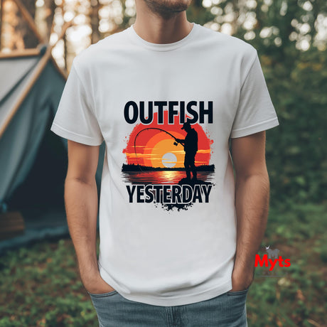 Person wearing a white t-shirt with a fishing graphic and text 'Outfish Yesterday' in an outdoor setting.