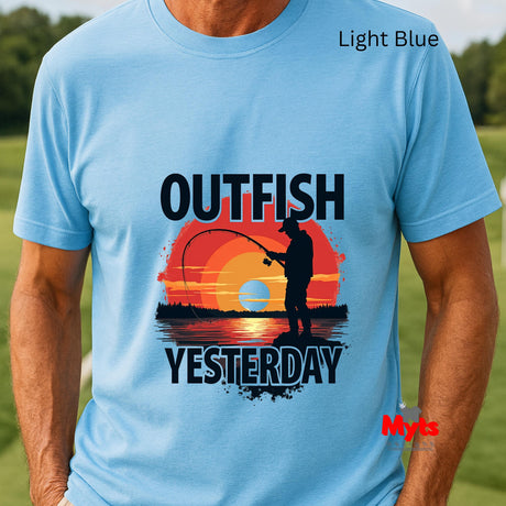 Light blue t-shirt with a fishing graphic and text 'Outfish Yesterday' on a grassy background.