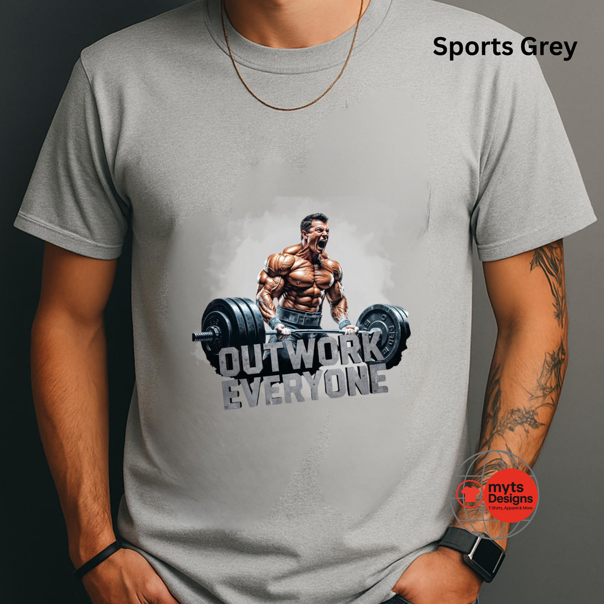 Gray t-shirt with a graphic of a muscular man lifting weights and text 'Outwork Everyone' on a dark background.