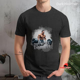 Person wearing a dark heather t-shirt with a graphic design and text 'Outwork Everyone' on a textured wall background. heather