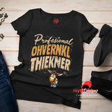 Black t-shirt with humorous text design on a wooden surface, featuring a donkey graphic.