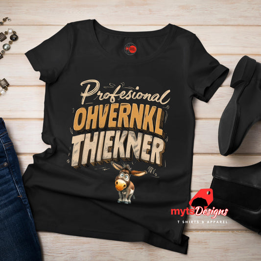 Black t-shirt with humorous text design on a wooden surface, featuring a donkey graphic.