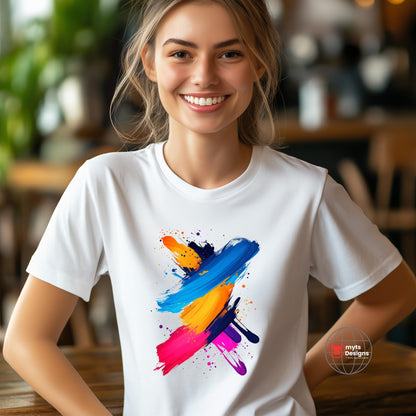 Smiling woman wearing a white T-shirt with a vivid, abstract brushstroke design in vibrant blue, orange, yellow, pink, and purple tones – perfect for artists and creative expression.