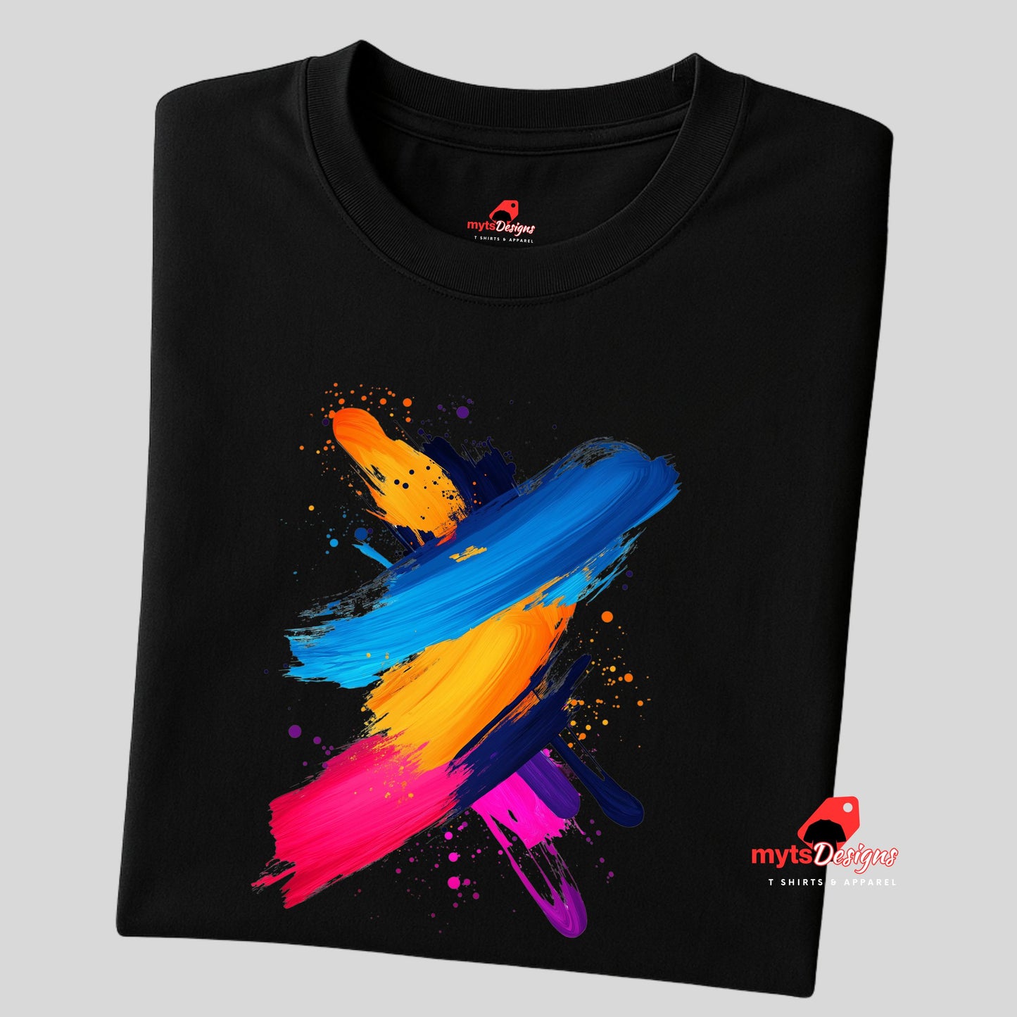 Black t-shirt with colorful abstract design on a gray background
