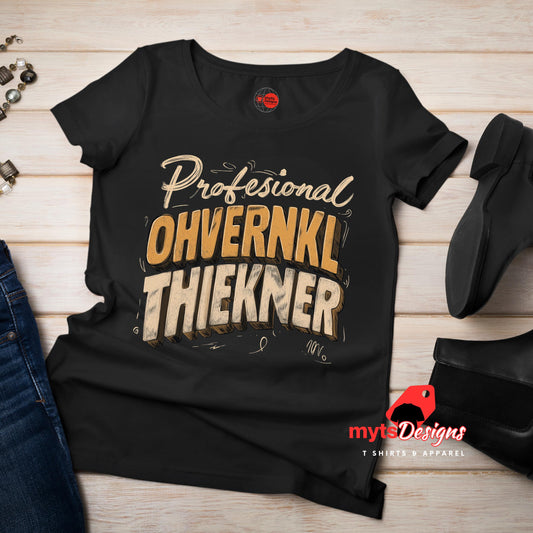 Black t-shirt with text design on a wooden surface, featuring the brand 'myts Designs'.