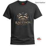A dark heather charcoal gray t-shirt with a graphic of a raccoon's face and the text 'RACCOON STAY WILD' in a metallic gold tone. The brand name 'Myts' is visible on the inner neck label and as a watermark logo in the bottom right corner.