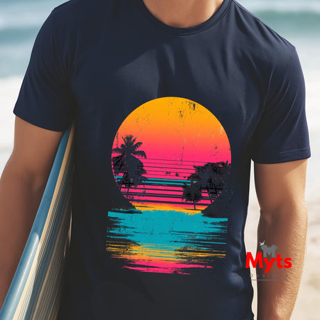 Person wearing a t-shirt with a colorful sunset design on a beach
