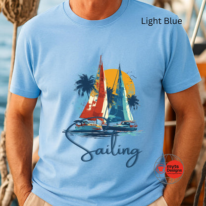 Light blue t-shirt with sailing graphic and 'Sailing' text, worn by a person.