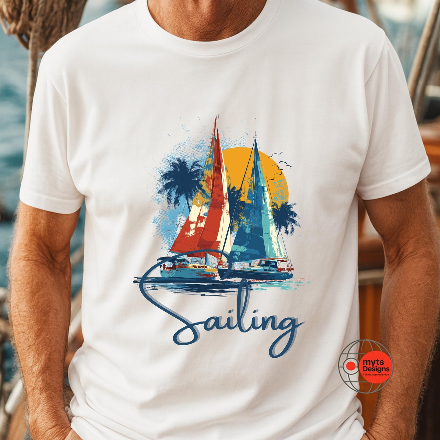 White t-shirt with sailboat graphic and 'Sailing' text worn by a person.
