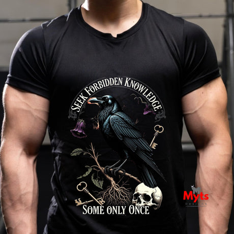Person wearing a black t-shirt with a raven and skull design and 'Seek Forbidden Knowledge' text.