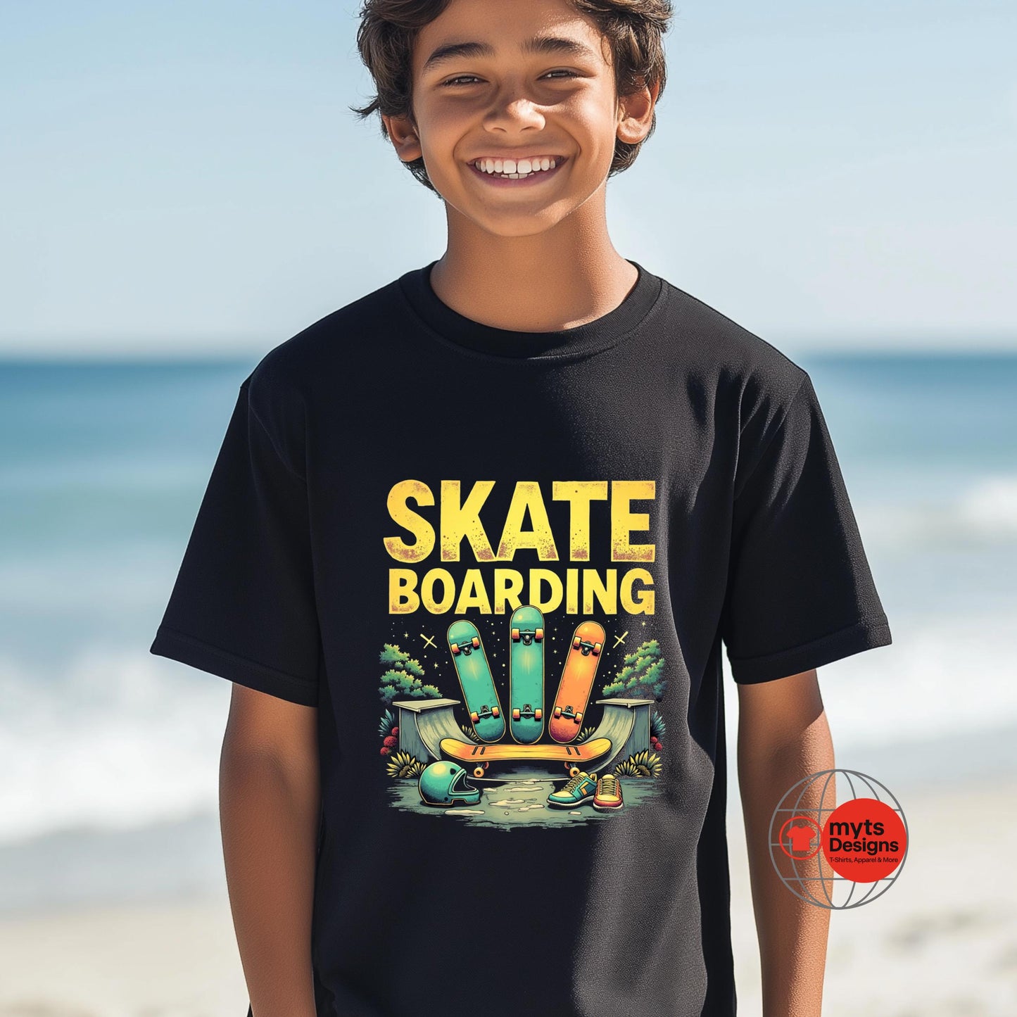 Child wearing a black t-shirt with 'Skateboarding' graphic on a beach