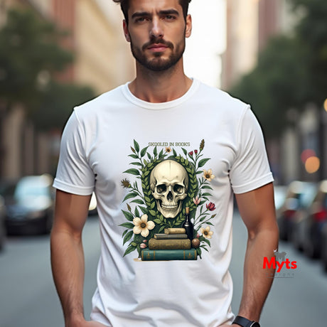 Man wearing a white t-shirt with a skull and floral design on a city street.