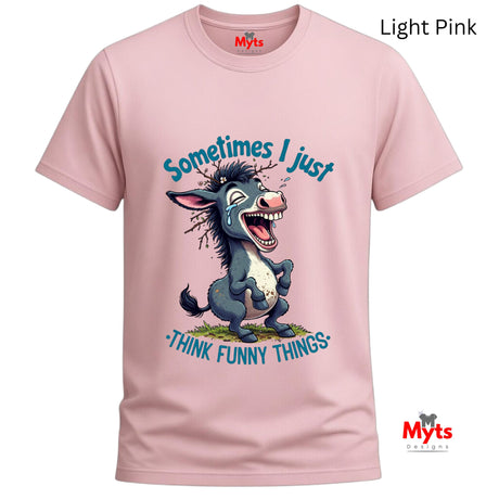 Light pink t-shirt with a cartoon donkey and humorous text on a white background