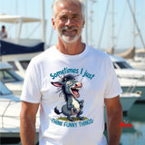 Man wearing a white t-shirt with a cartoon donkey graphic and text at a marina.