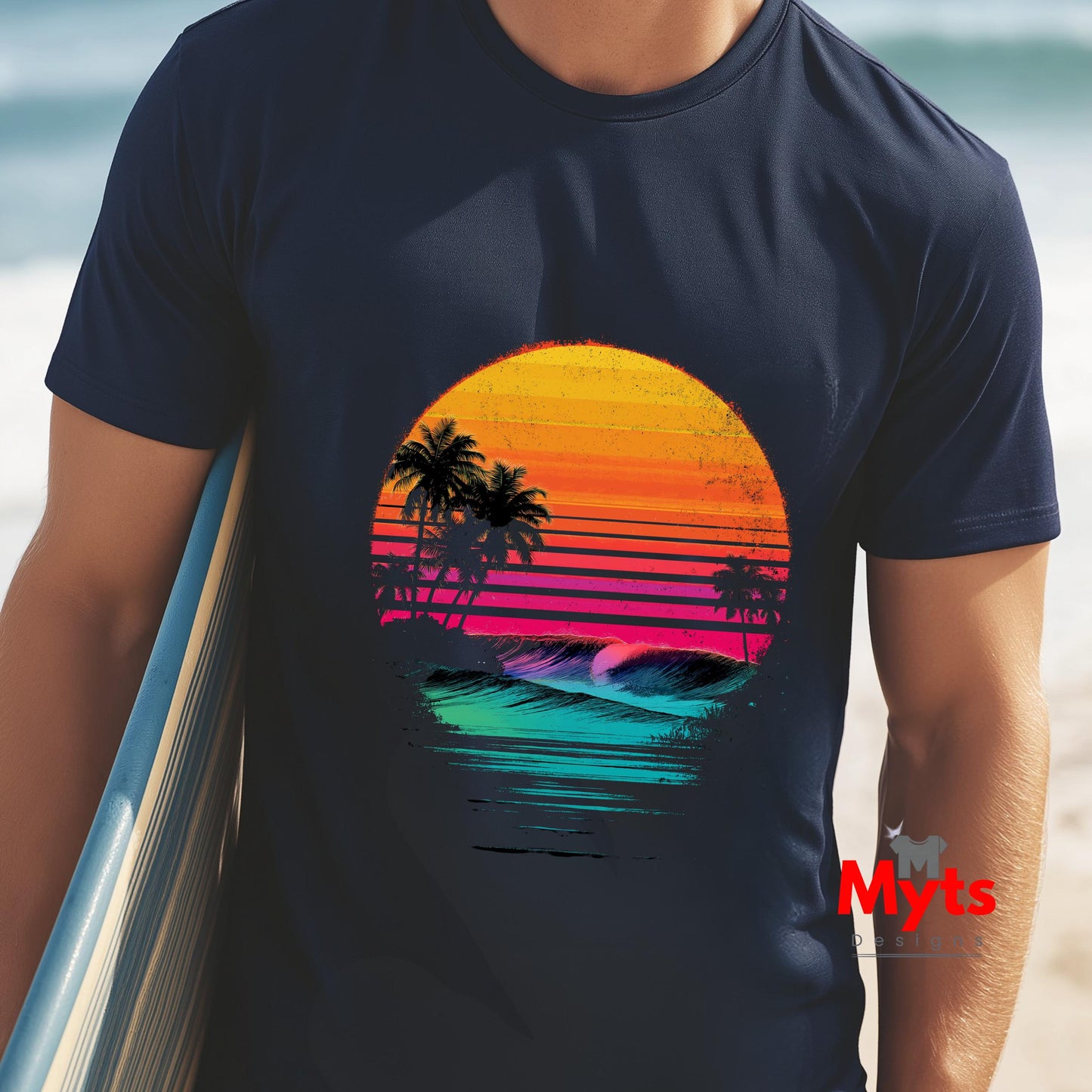 Person wearing a navy blue t-shirt with a colorful sunset design on a beach.