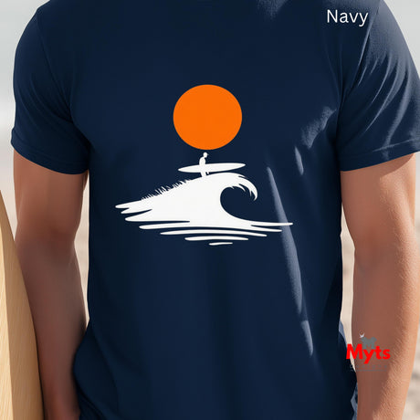 Navy t-shirt with a graphic of a surfer on a wave and an orange sun, worn by a person.