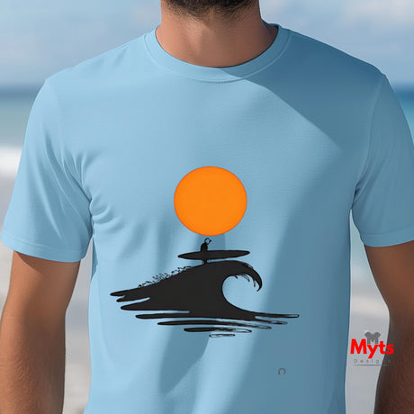 Light blue t-shirt with a graphic of a surfer on a wave and an orange sun, worn by a person.