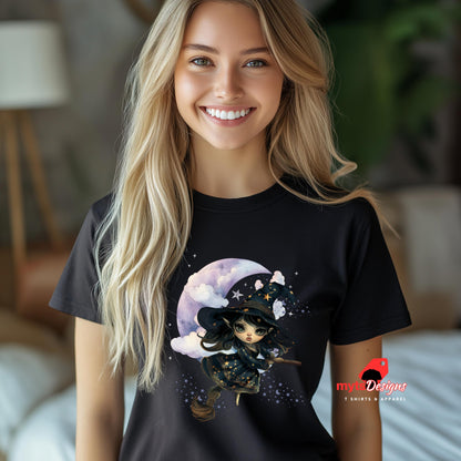 Woman wearing a black t-shirt with a witch graphic design, standing in a blurred indoor setting.