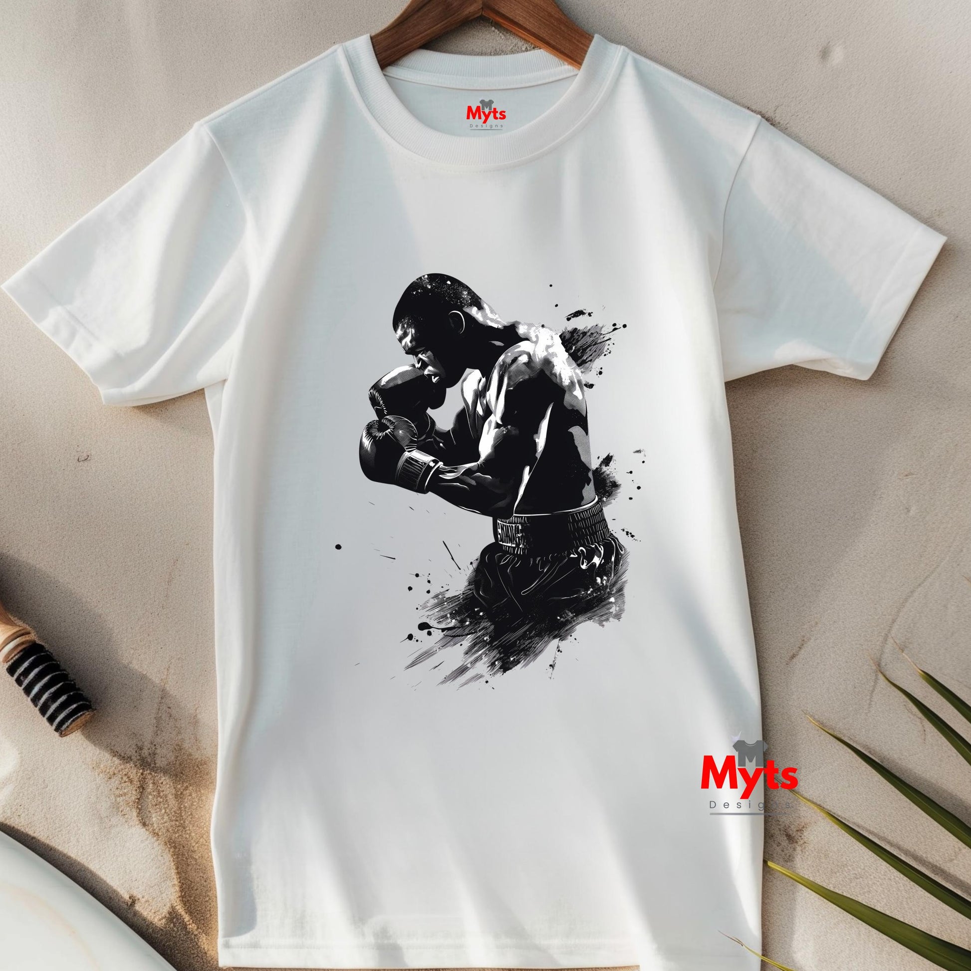 White t-shirt with a black boxing graphic and 'Myts' branding on a neutral background