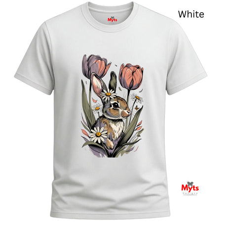 A white short-sleeve crewneck t-shirt featuring a detailed graphic print of a brown rabbit surrounded by pink tulips and white daisies. The brand name 'Myts' is visible on the inner neck label and as a watermark in the bottom right corner.