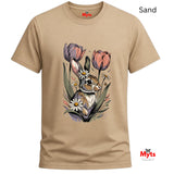 A sand-colored short-sleeve t-shirt with a graphic print of a rabbit nestled among tulips and daisies. The brand name 'Myts' is visible on the inner neck label and as a watermark in the bottom right corner.