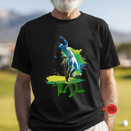 Person wearing a black t-shirt with a colorful graphic and 'The Drive' text on a golf course.